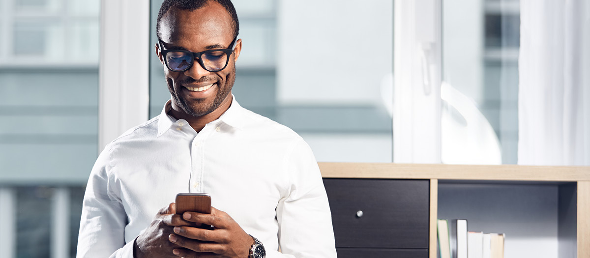 man smiling on phone